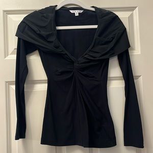 Long sleeve top. XS. Worn only a few times. Deep neck.